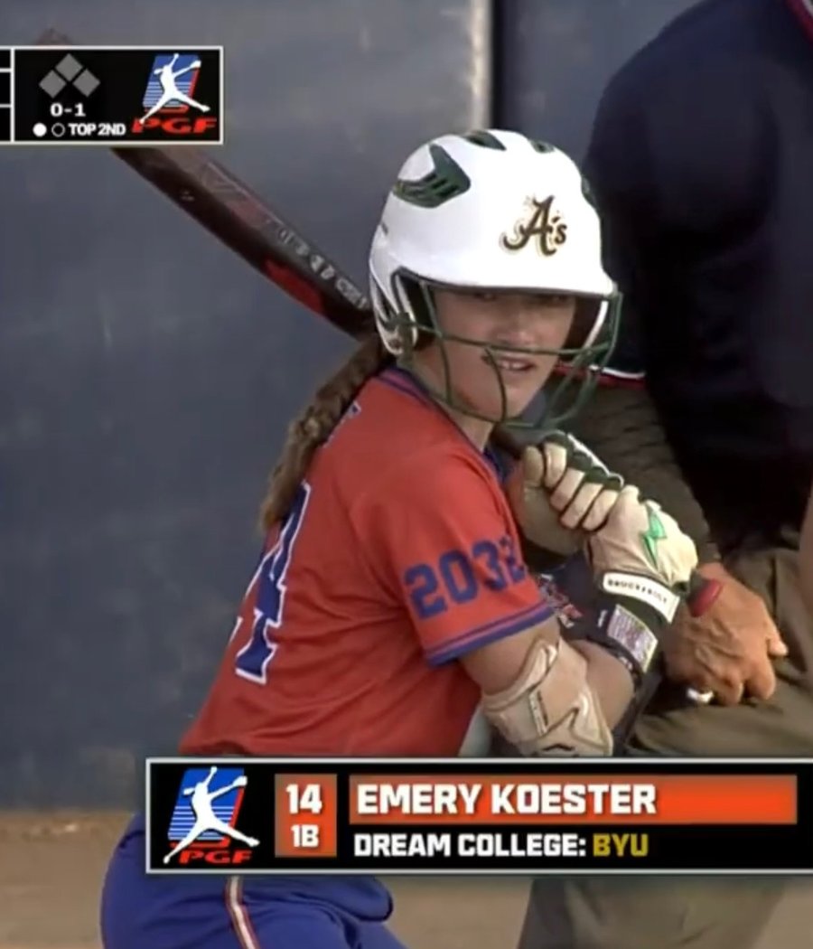 Kyle's daughter at bat during a travel softball championship